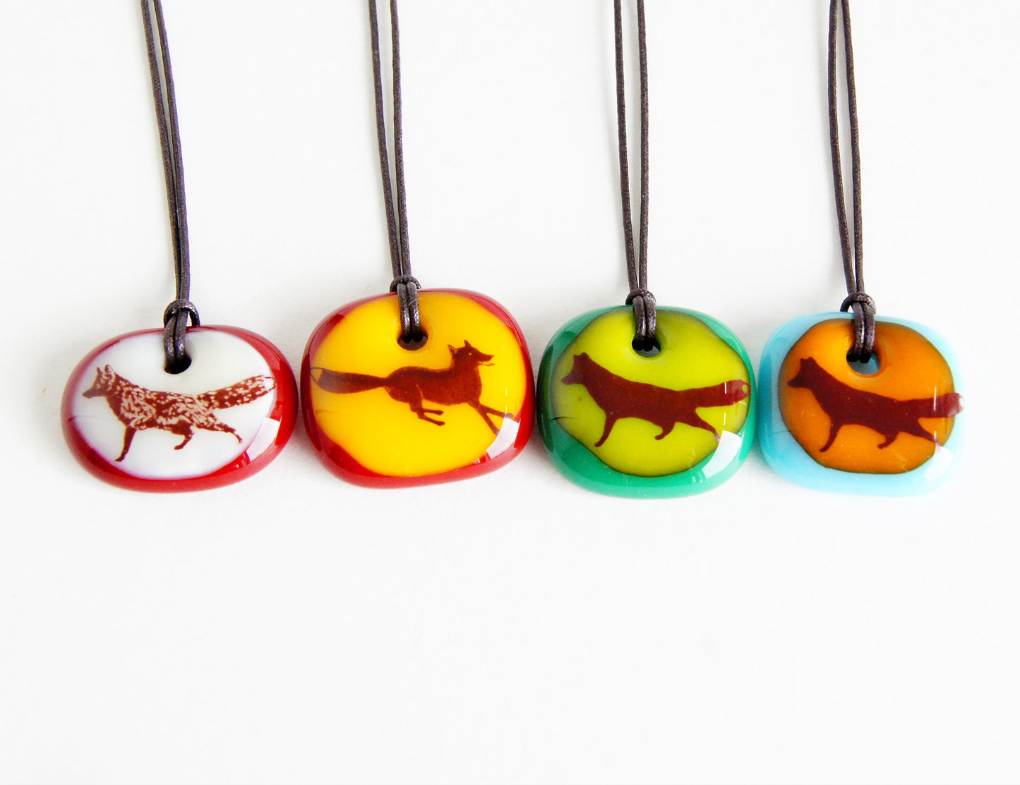 Your choice of handmade fox necklace on cotton cord.