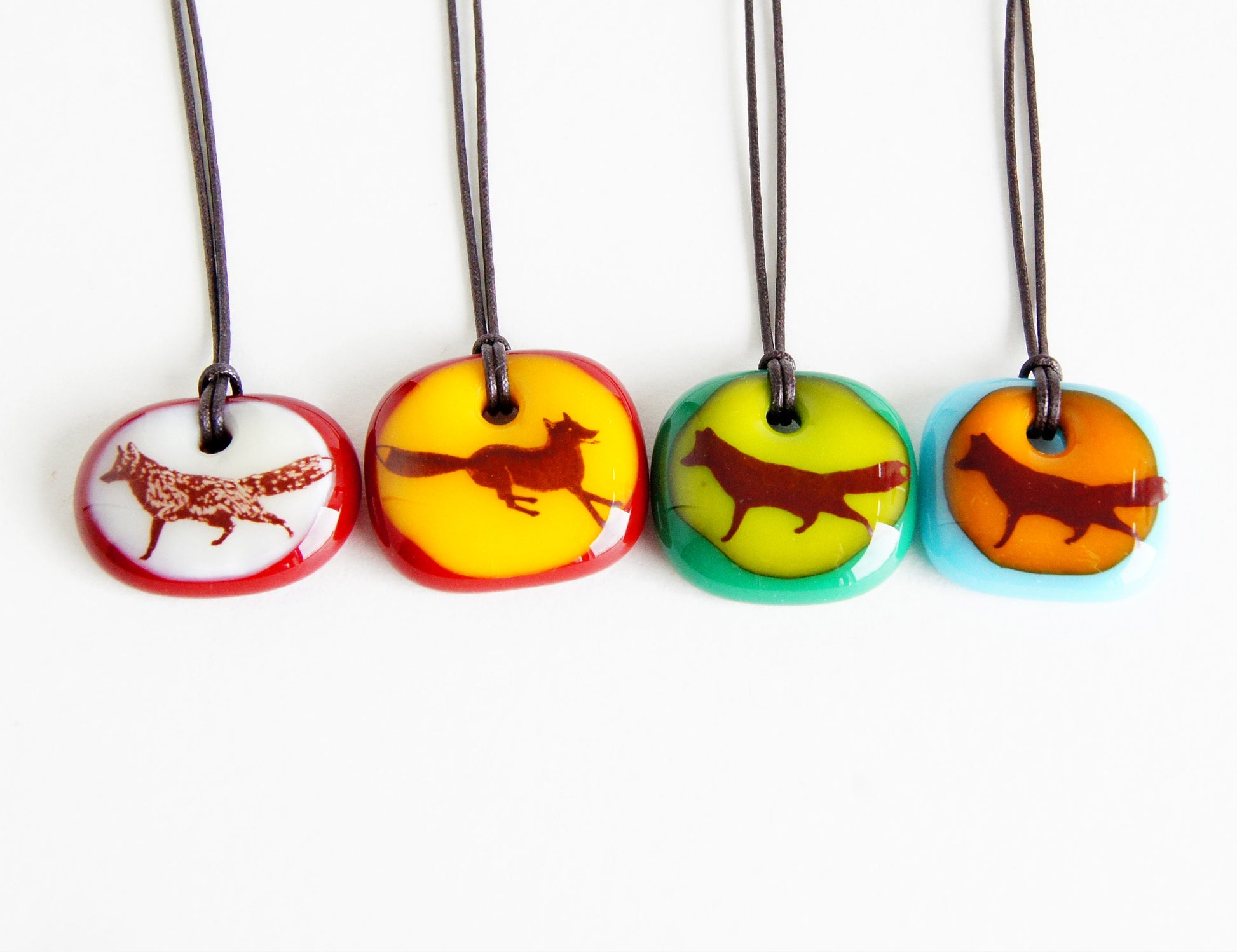 Your choice of handmade fox necklace on cotton cord.