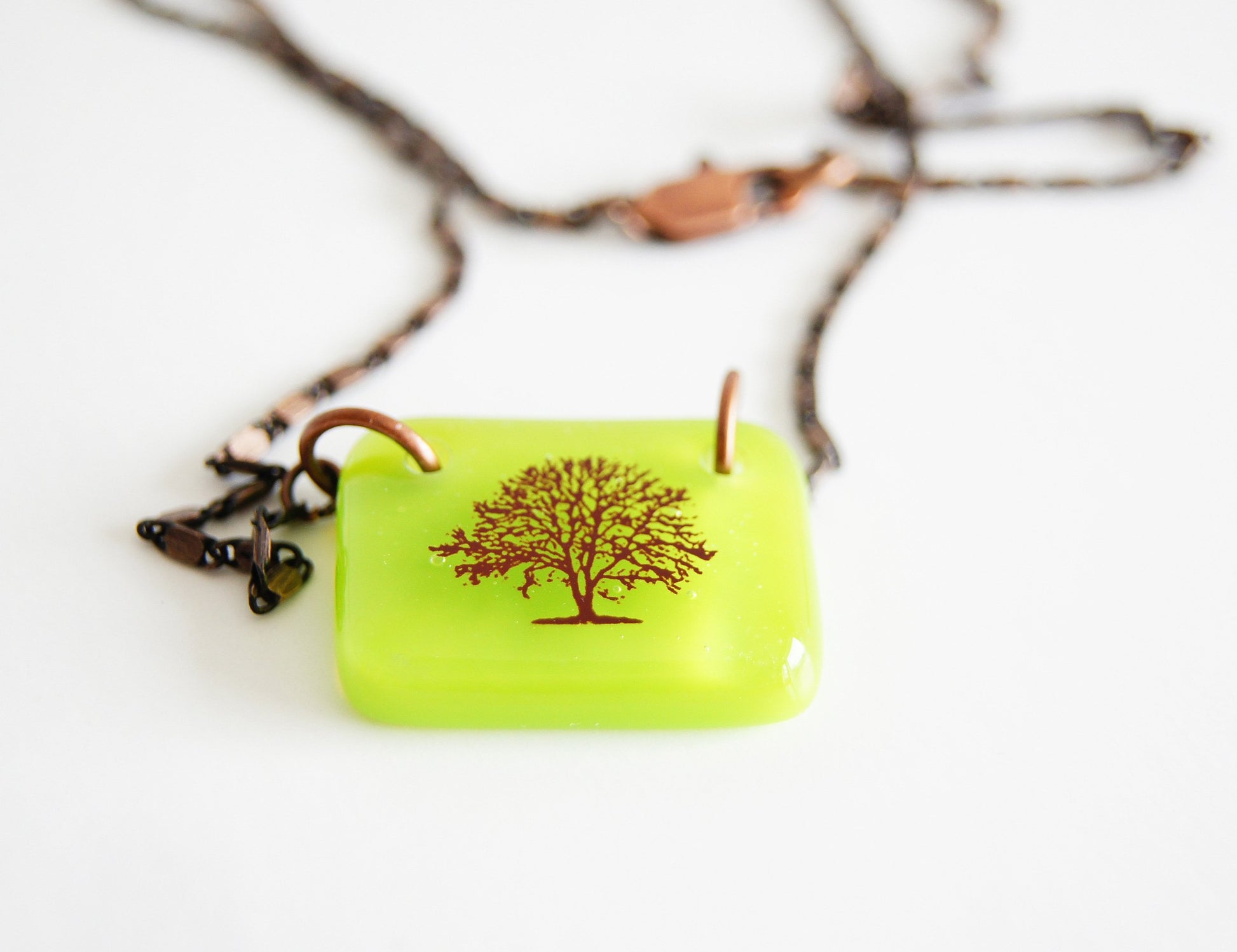 Tree necklace in spring green on antiqued copper chain 