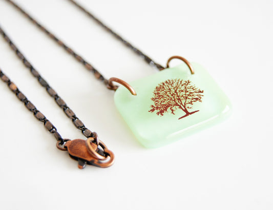 Mint green glass pendant on vintage style copper chain
