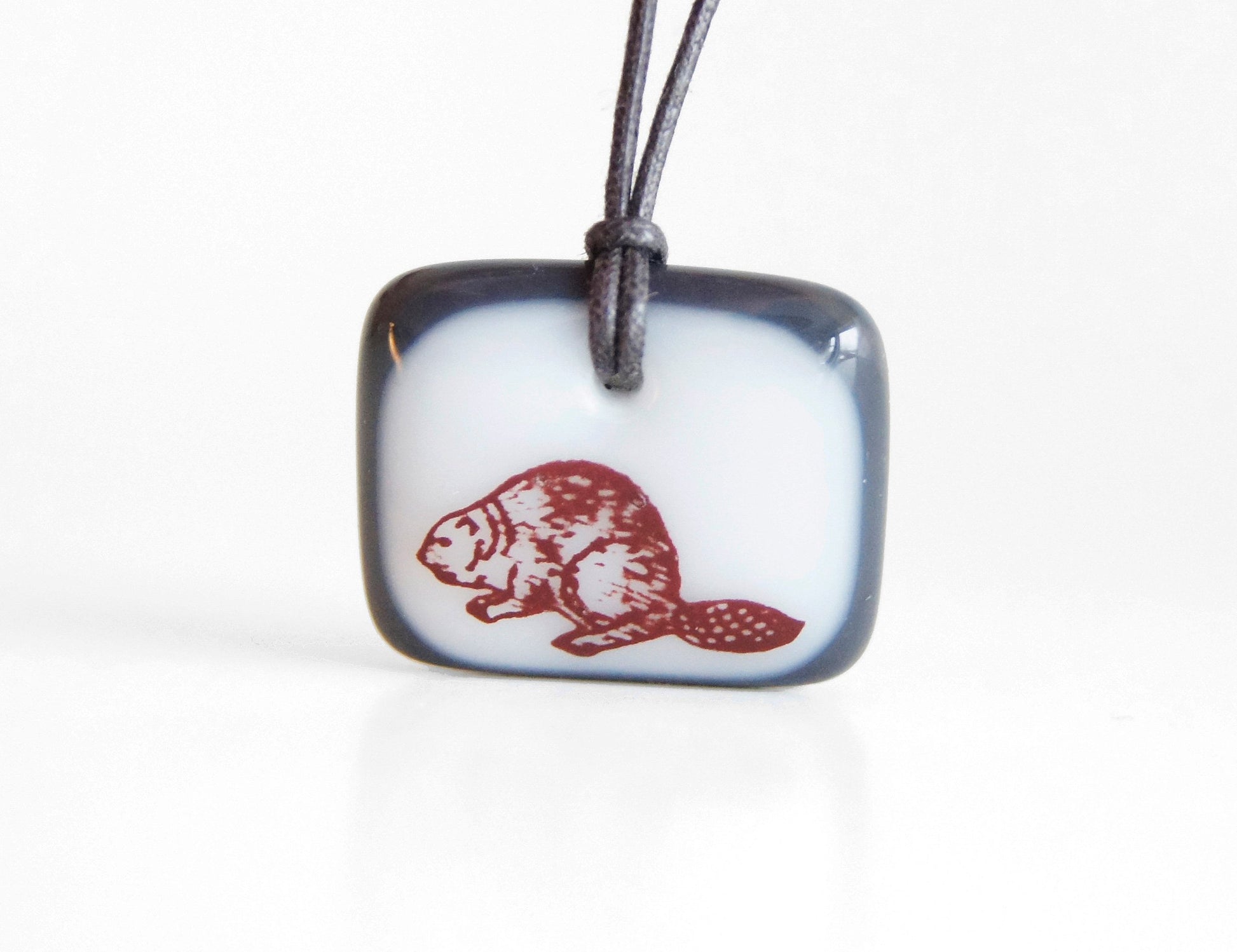 fun handmade beaver necklace in white and charcoal