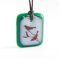 Bird branch necklace in jade green and milk white. 