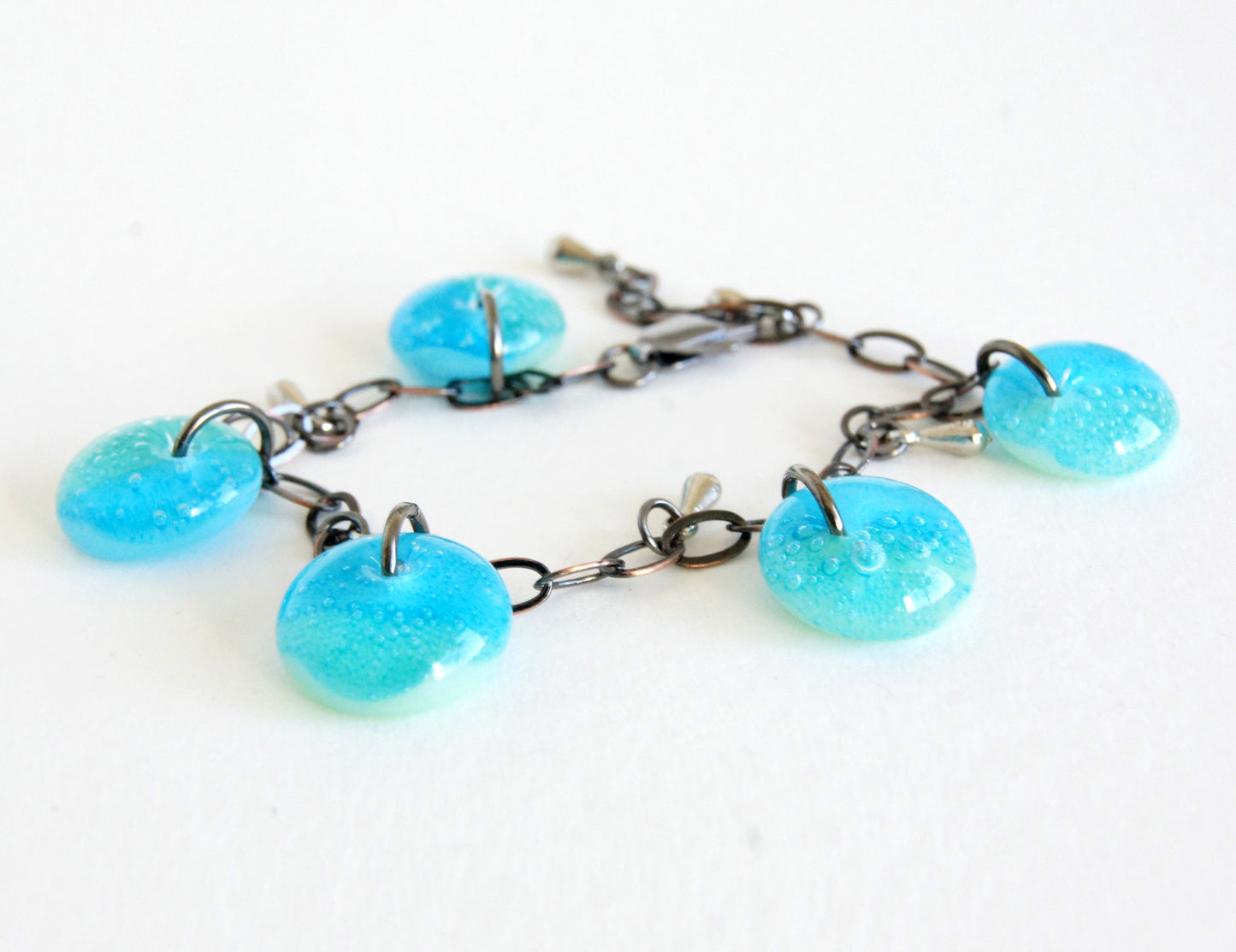 Aquamarine and green glass drop charm bracelet