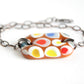 Multicolor spotted brown fused glass adjustable bracelet.