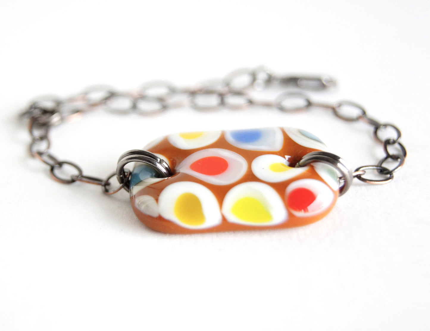 Multicolor spotted brown fused glass adjustable bracelet.