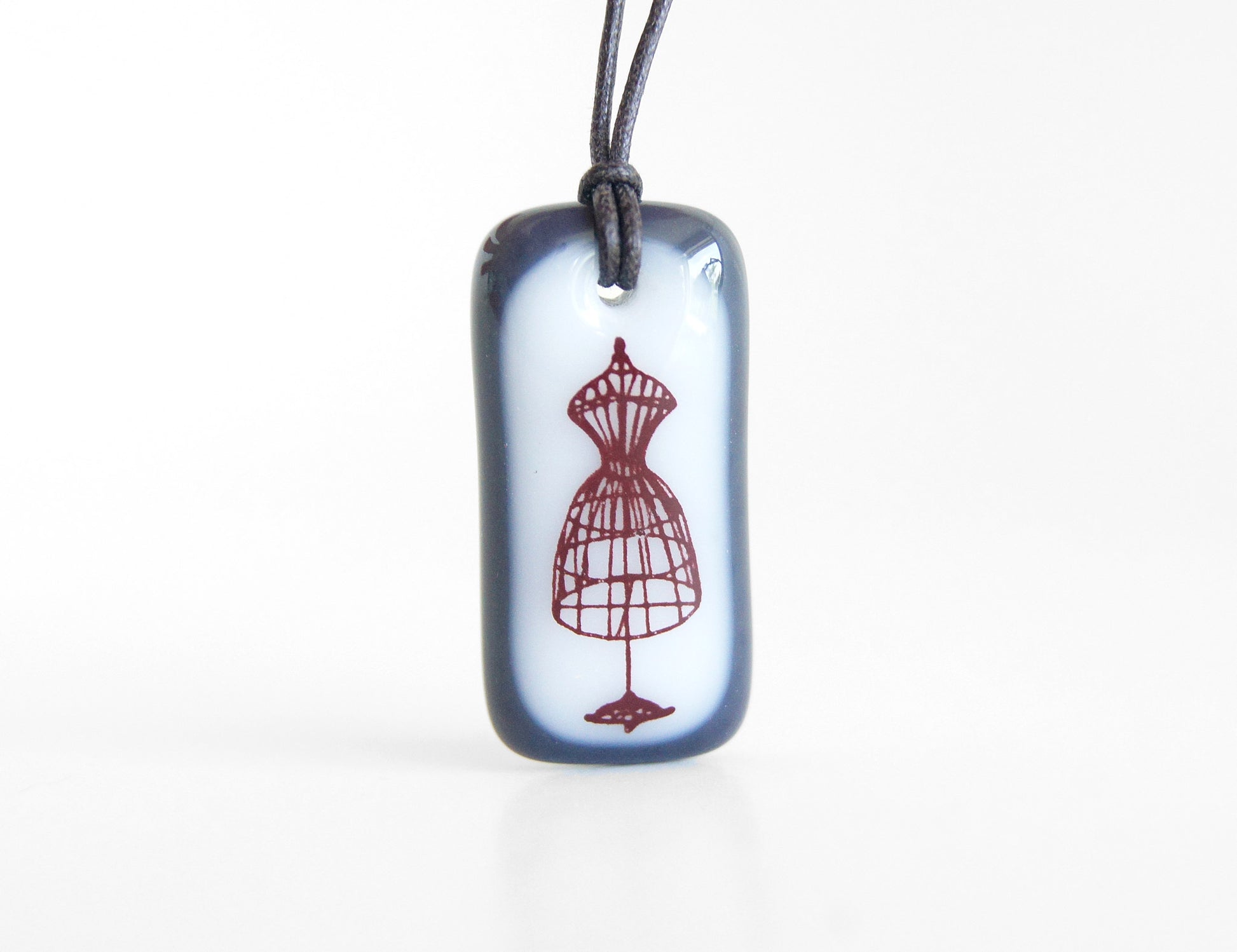 Dress Form Necklace in charcoal grey and white.