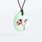 Delicate ginkgo leaf necklace in cream and pale mint green