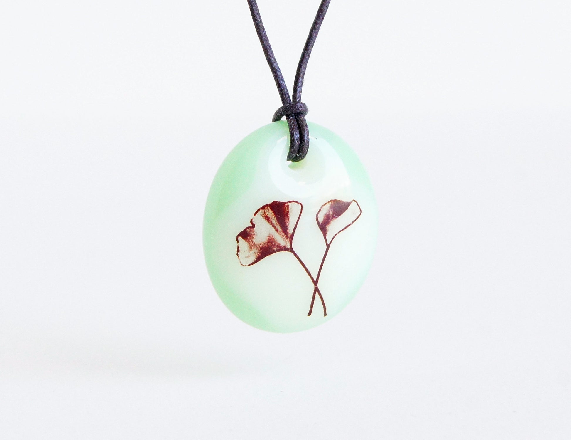 Delicate ginkgo leaf necklace in cream and pale mint green