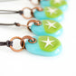 Your choice of star pendant on cotton cord. 