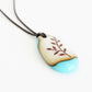 Botanical necklace in vintage colours turquoise glass. 
