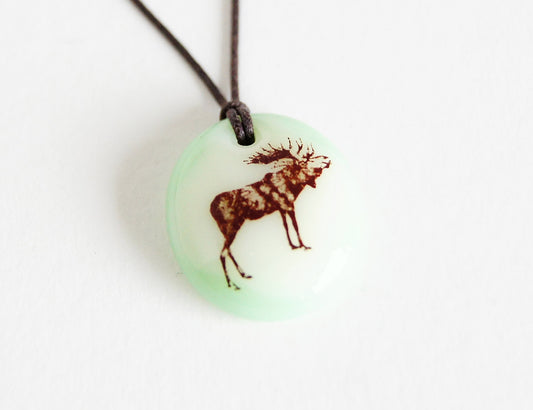 Moose necklace handmade in light green glass.