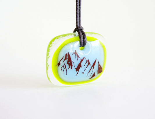 Mountain necklace with three peaks mountain range.