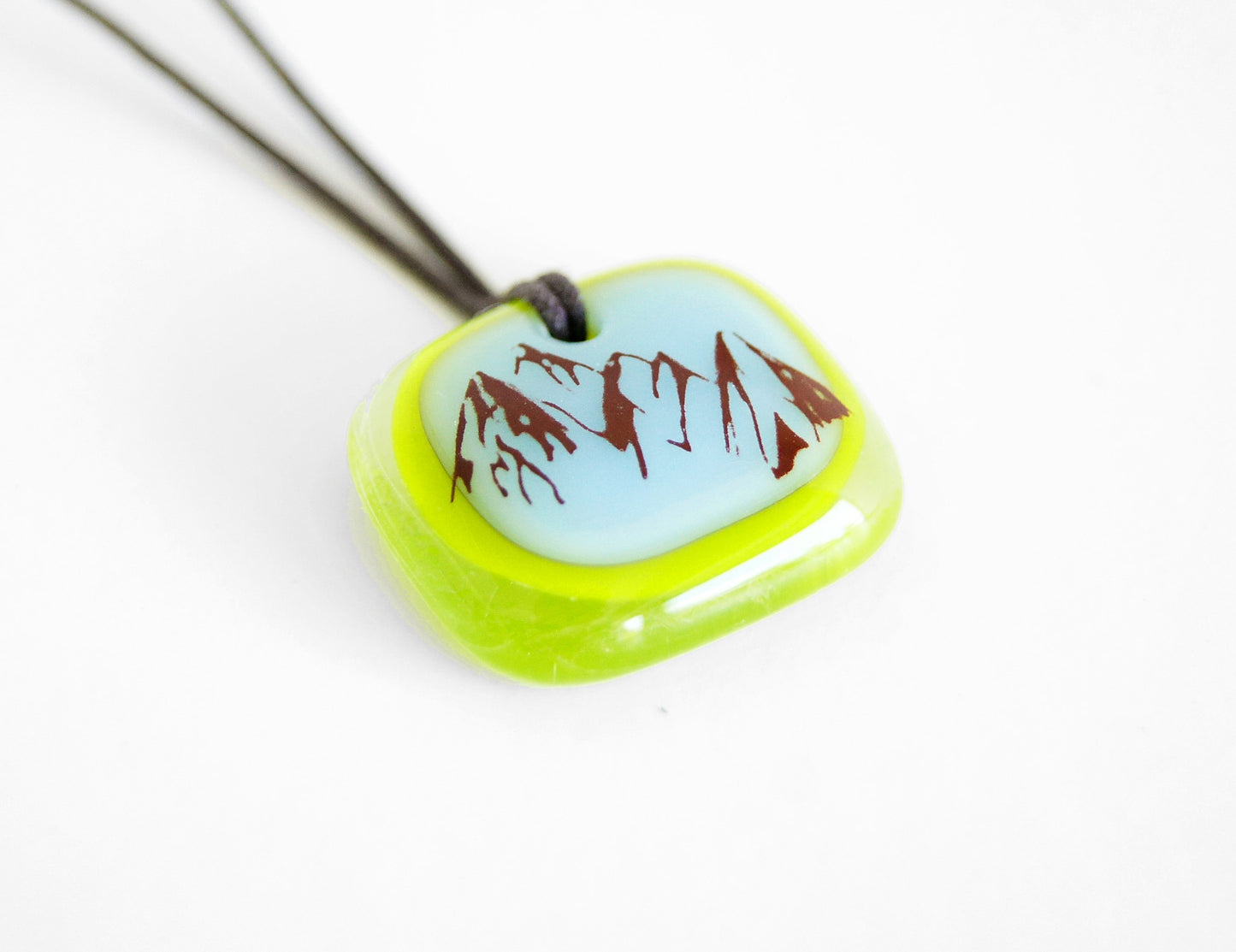 Three peaks Mountain pendant necklace in green and glacier blue. 