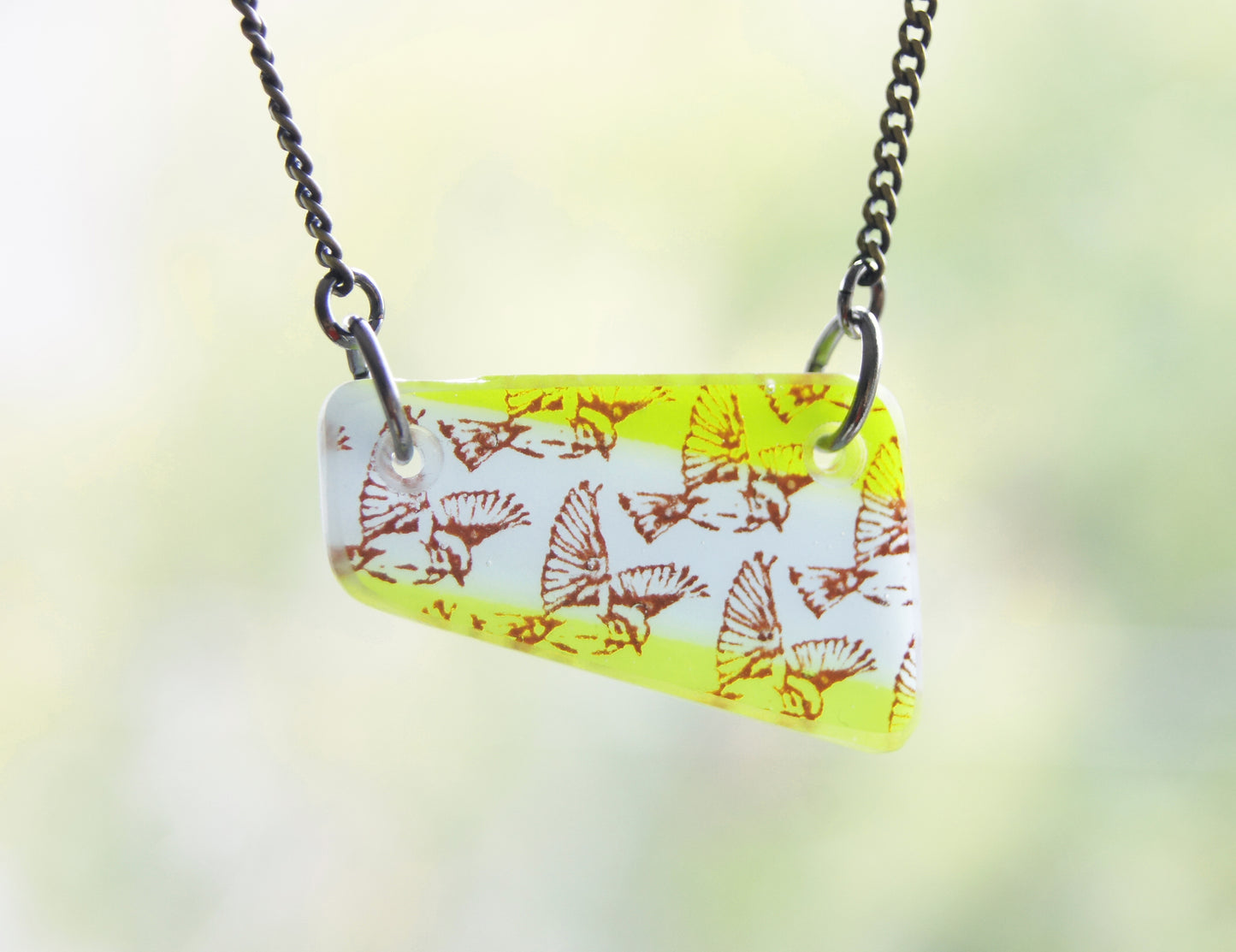 Flying Bird Necklace in green and blue.
