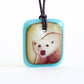 Polar bear necklace turquoise and vintage caramel glass.