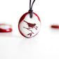 Red Bird Necklace in cream and dark red colours. 