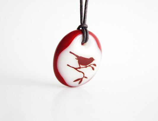 Bird in tree necklace handmade in glass.