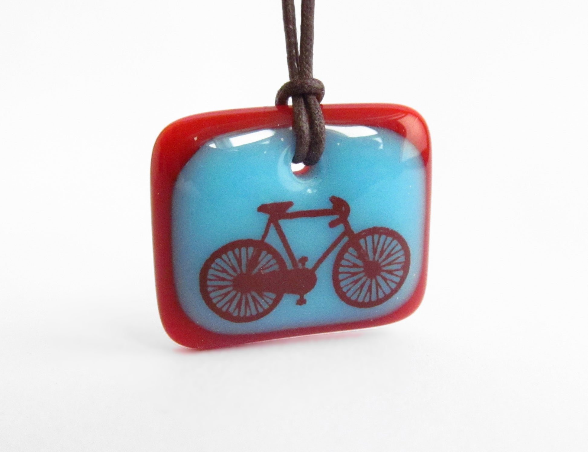 Road bike necklace in olive and jade green colours.