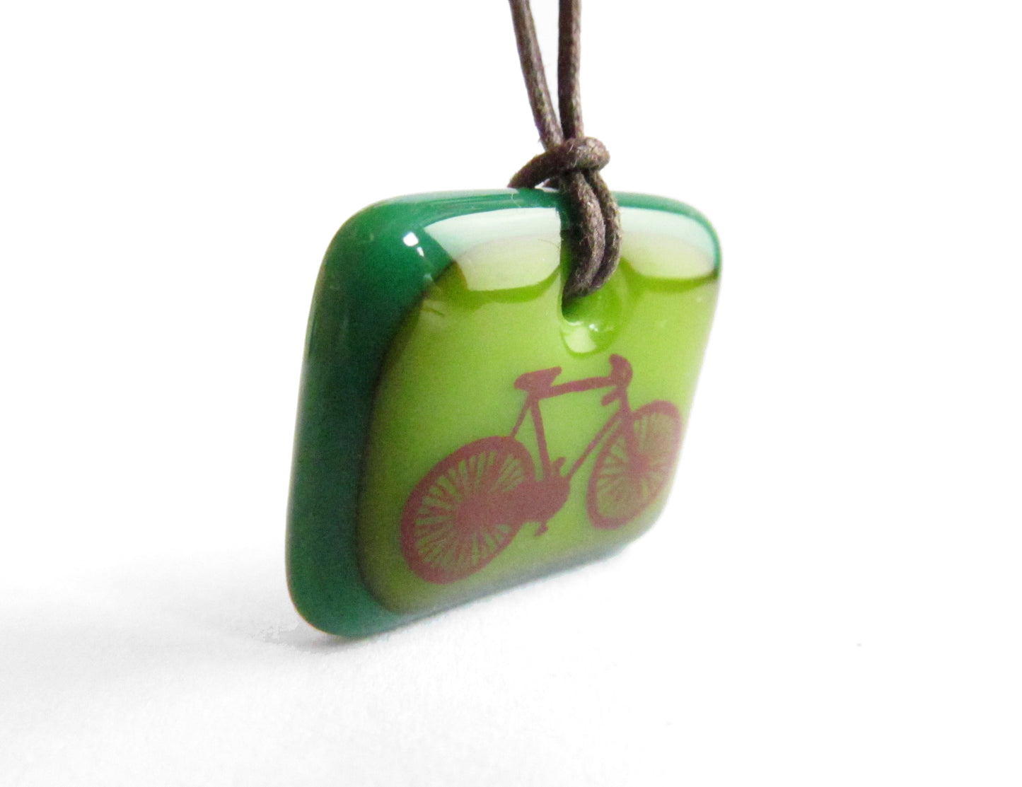 Road bike necklace in aqua blue a red colours. 