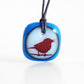 Songbird necklace in royal blue and milk white glass. 