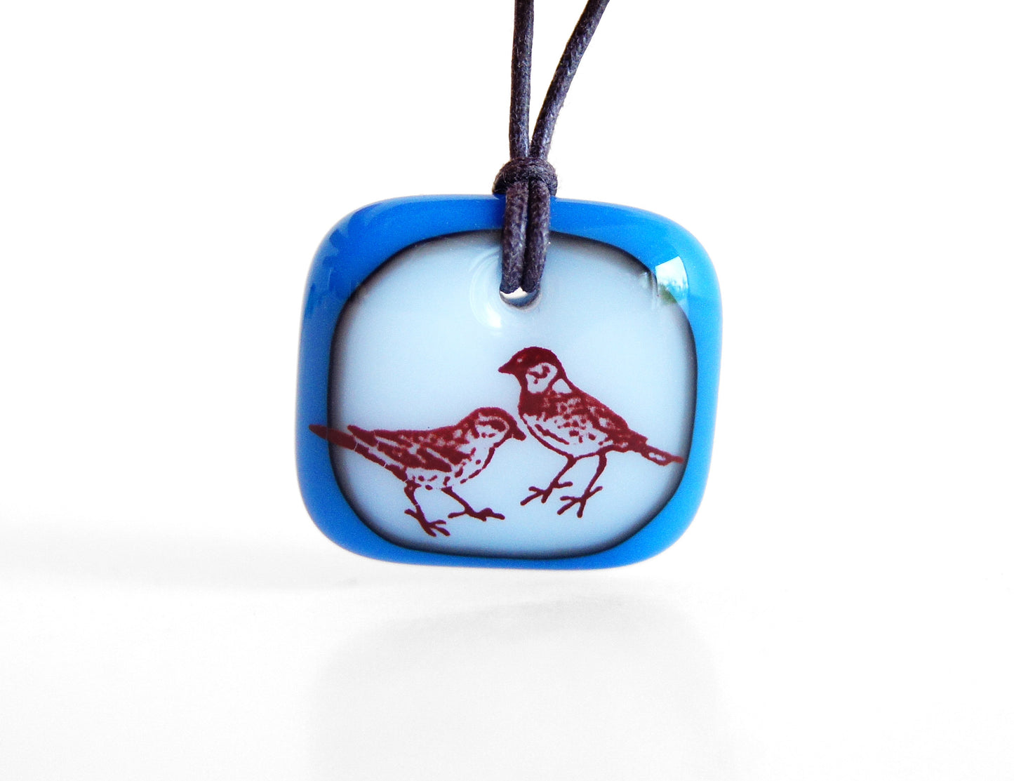 Sparrow Necklace in royal blue and milk white.
