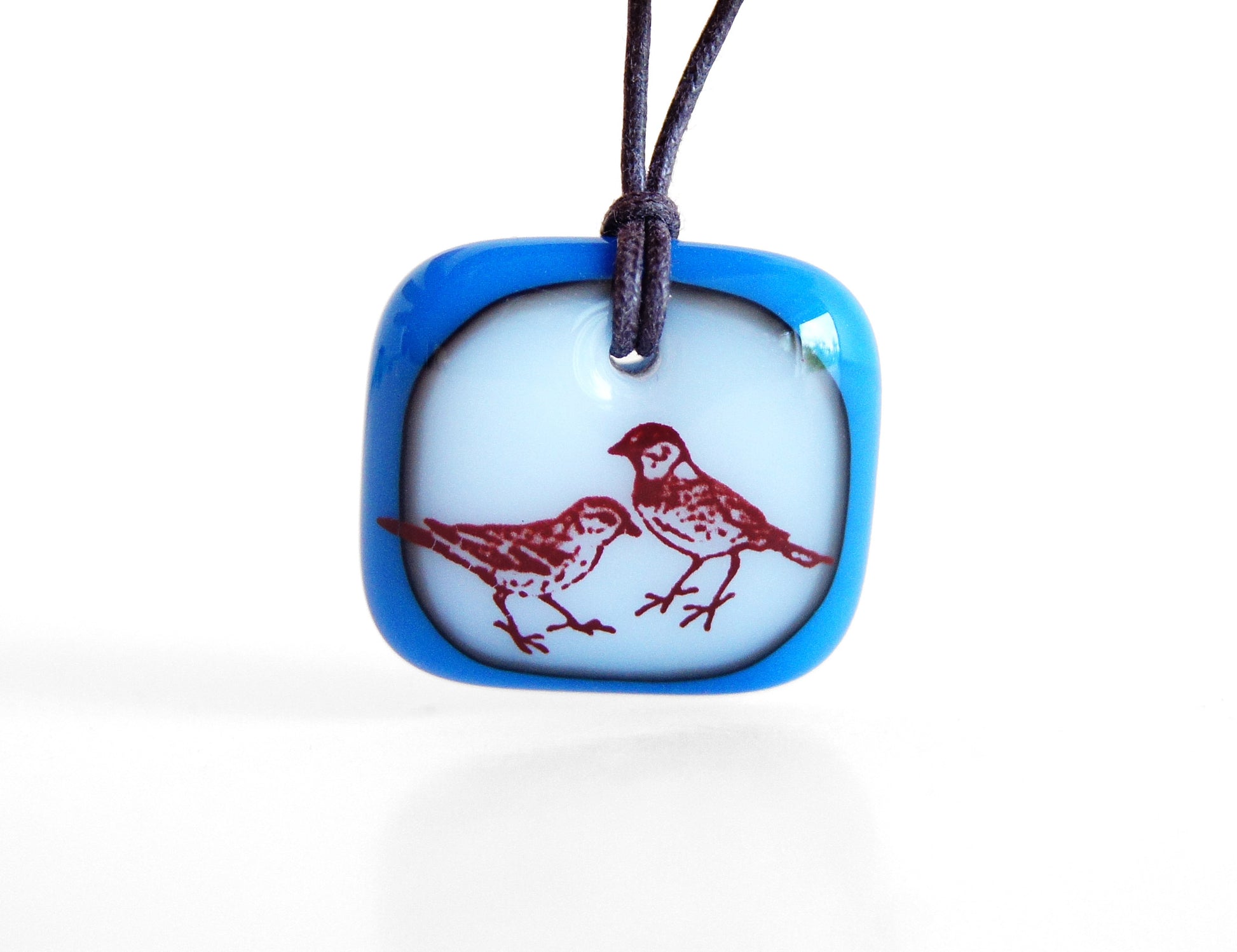 Sparrow Necklace in royal blue and milk white.