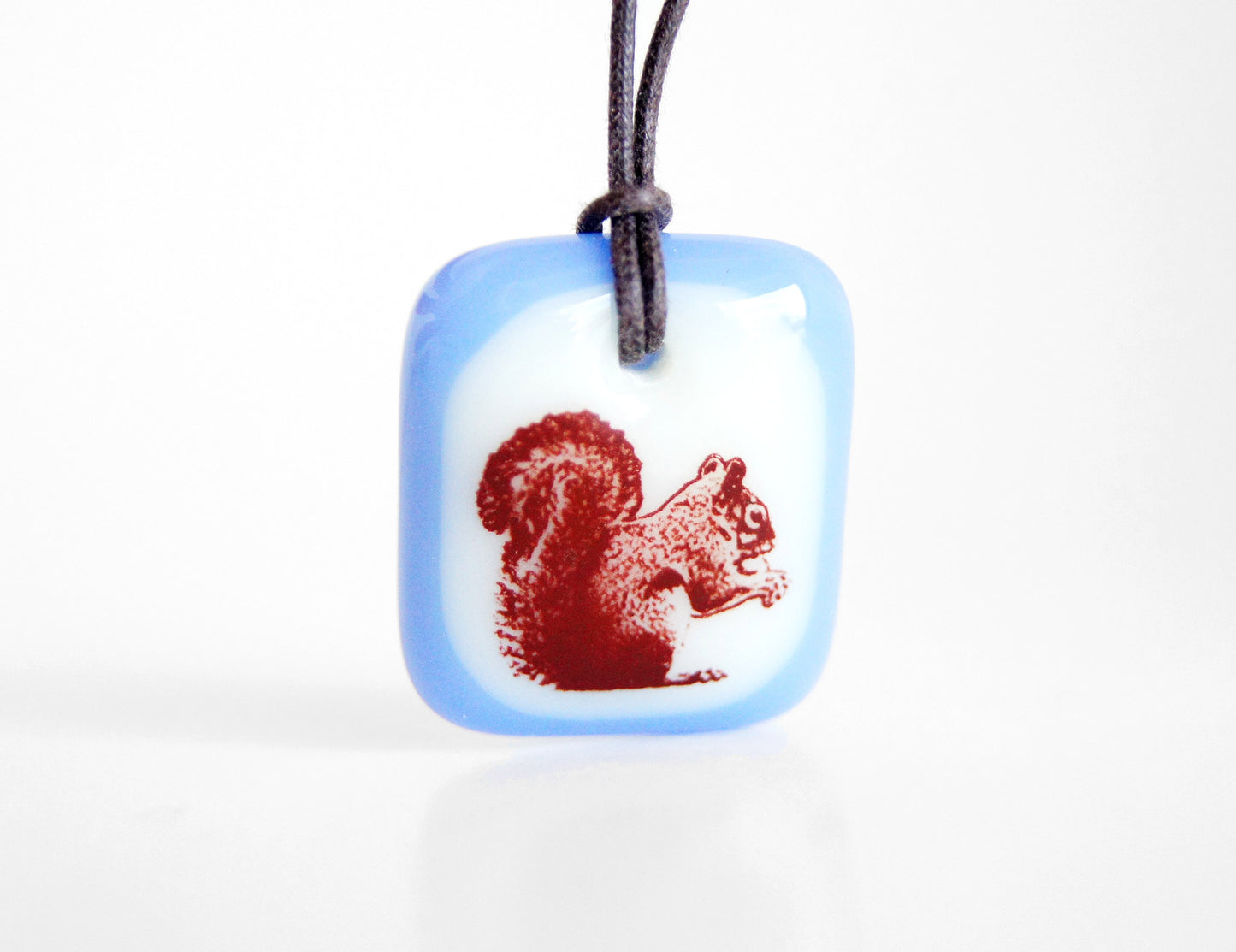 Grey squirrel jewellery in periwinkle blue.