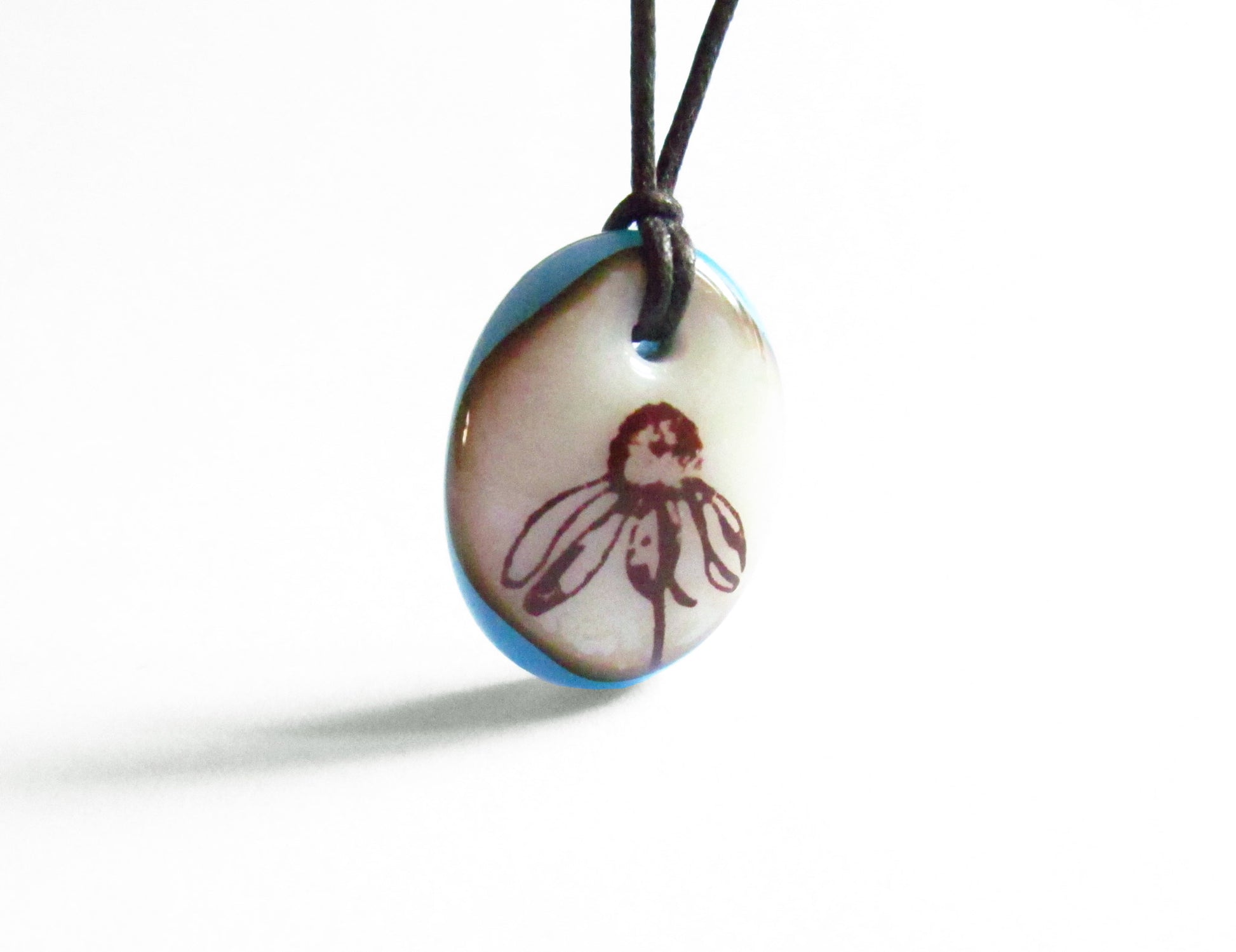 Wildflower Necklace in rustic aqua blue and cream colors.