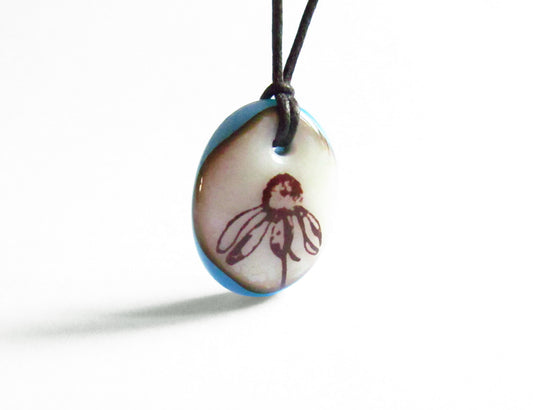Wildflower Necklace in rustic aqua blue and cream colors.