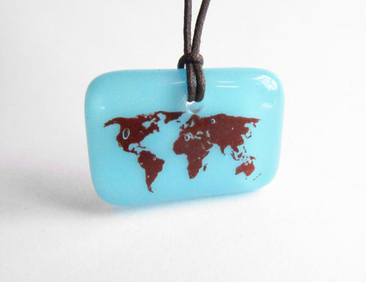 Blue map of the world pendant on cord necklace.