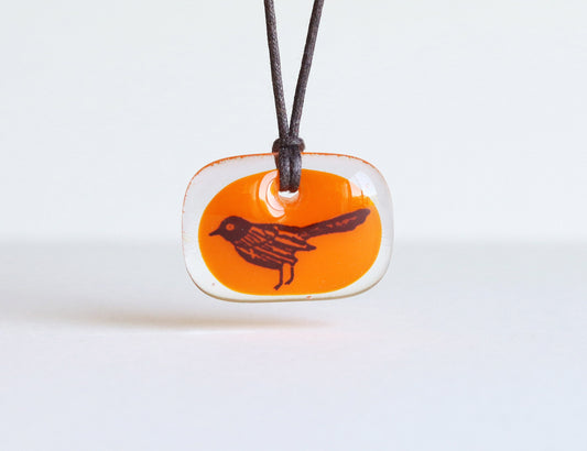 blackbird necklace orange and clear