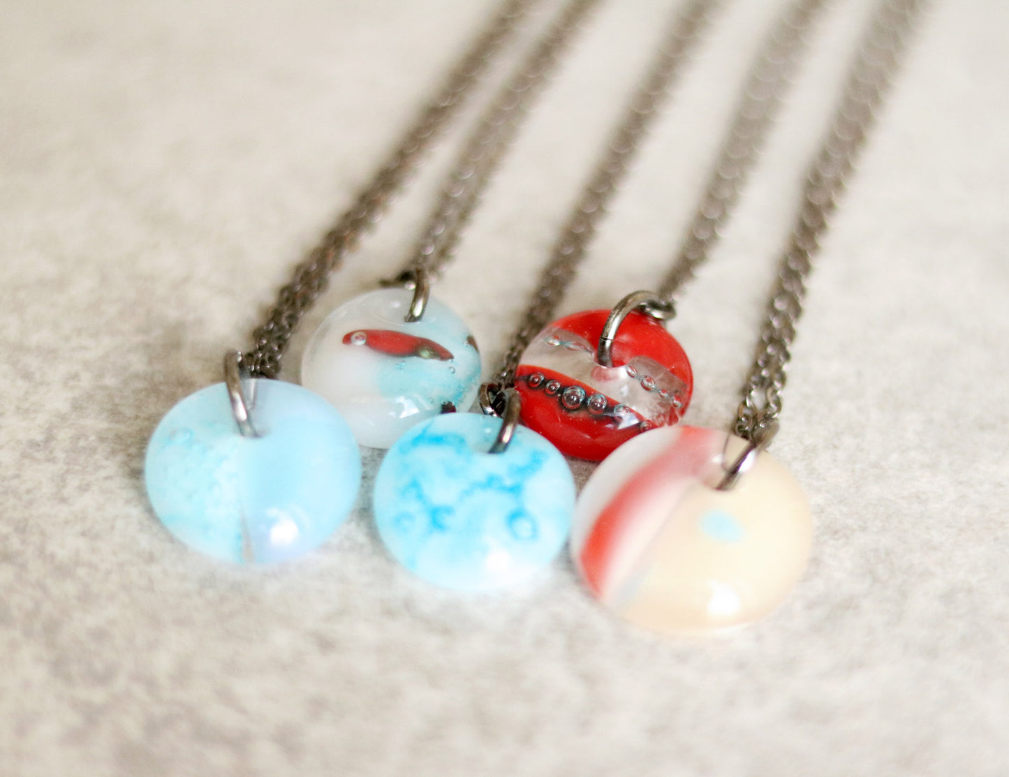 Necklace with colorful beads on a neutral background