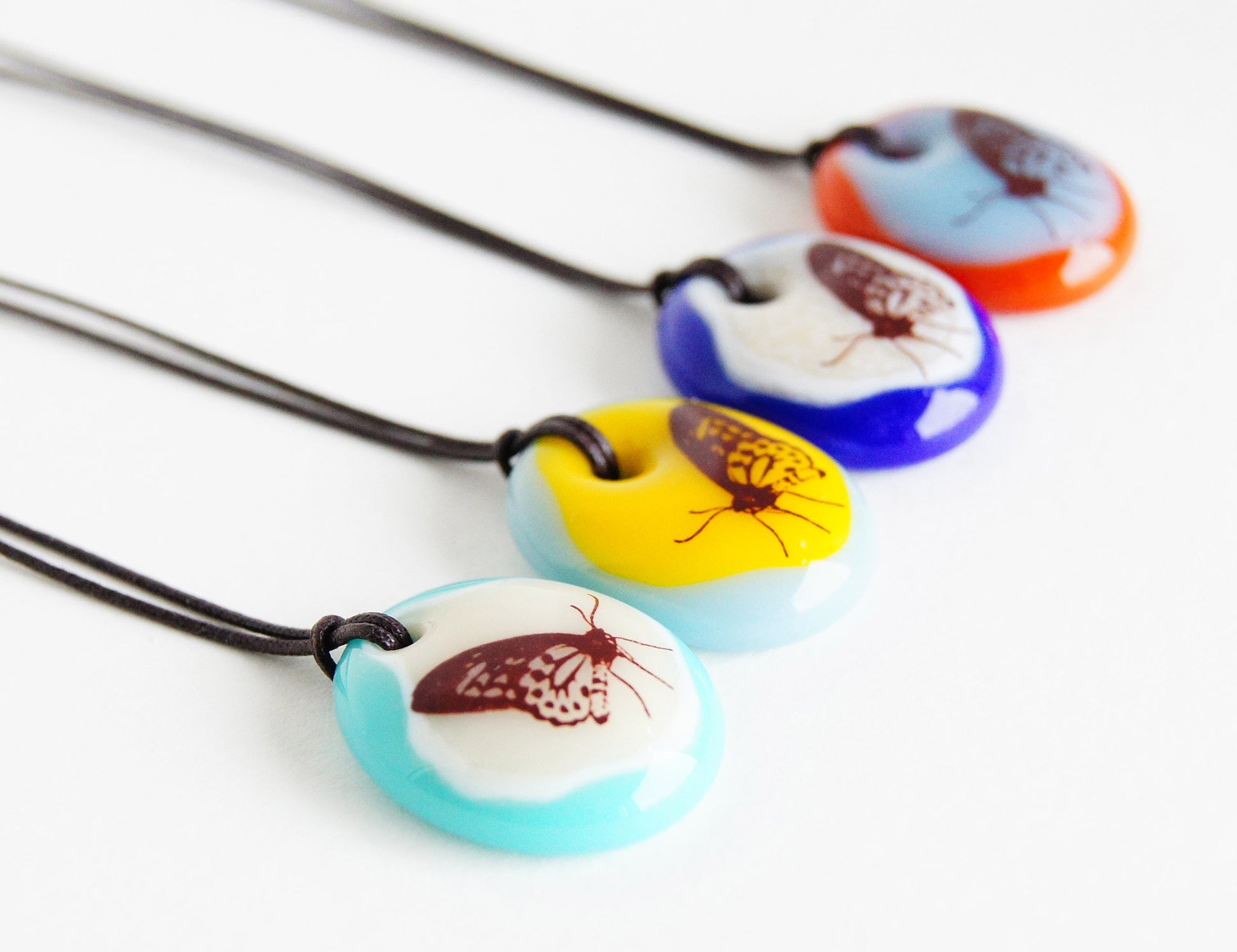 Limited batch of colourful glass butterfly necklaces