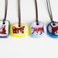 Your choice of handmade cat necklace on cotton cord. 