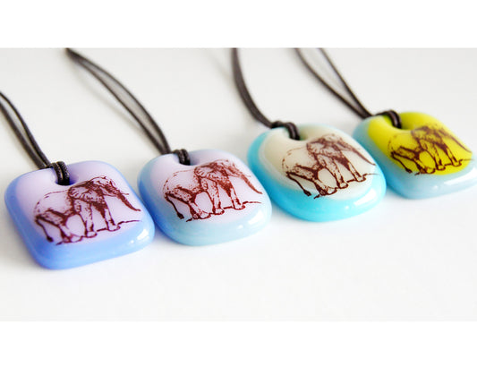 Your choice of handmade elephant necklace on cotton cord. 