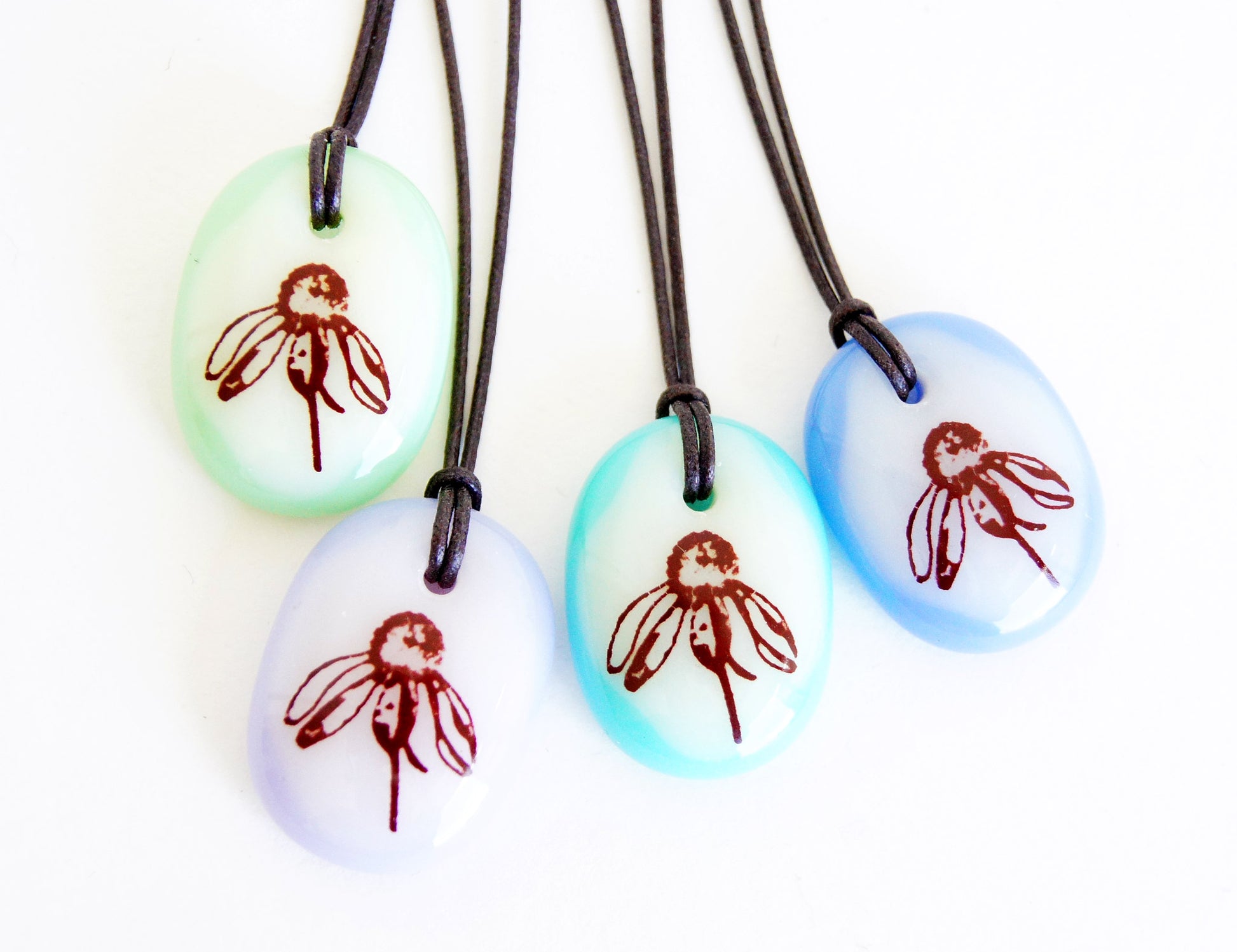 Your choice of handmade wildflower necklace on cotton cord. 