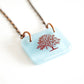 Colourful apple tree necklace handmade in glass by Leila Cools 