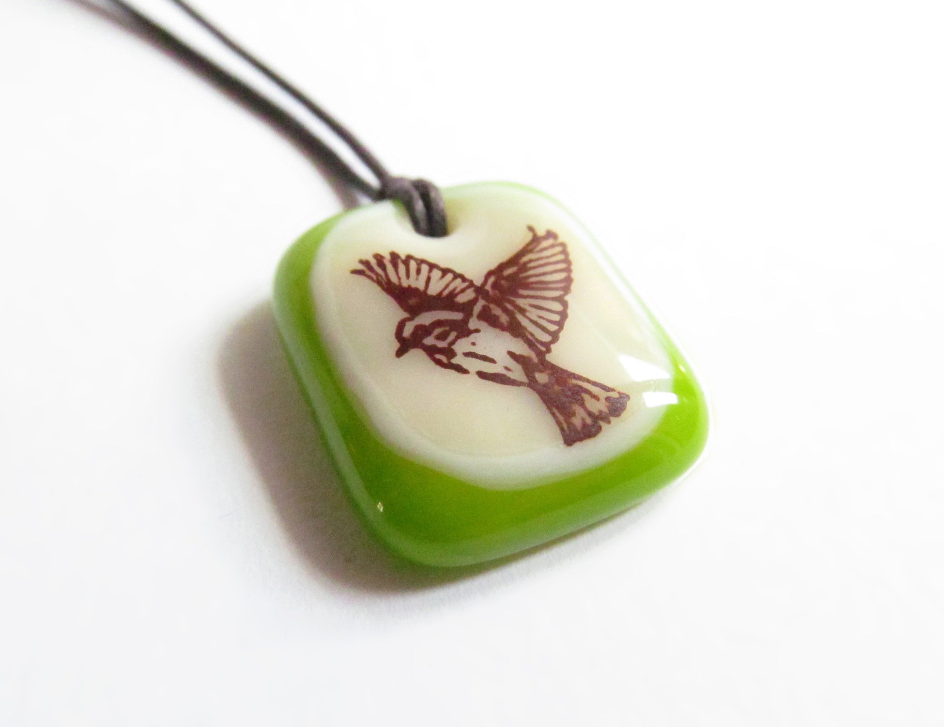 Green glass Flying Bird jewelry. 