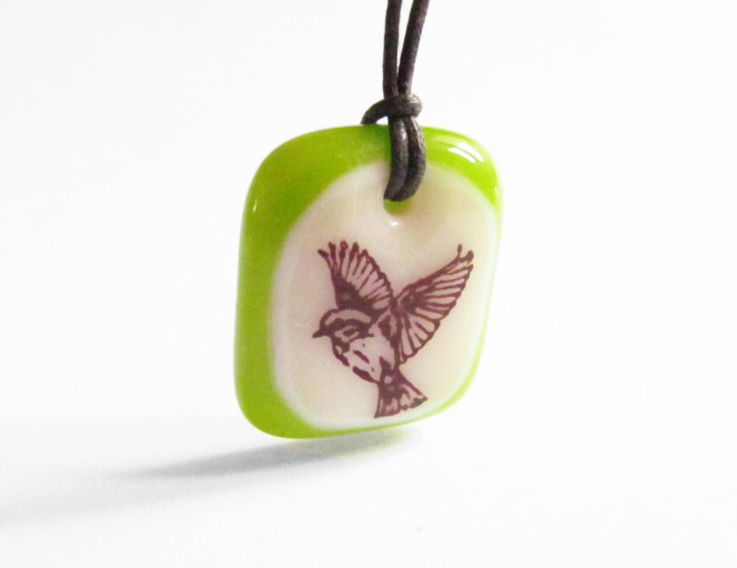 Apple green Bird in Flight necklace. 