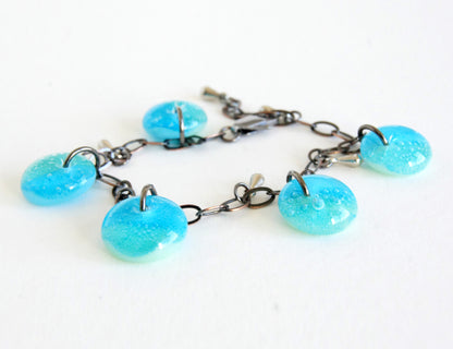 Aquamarine and green glass drop charm bracelet