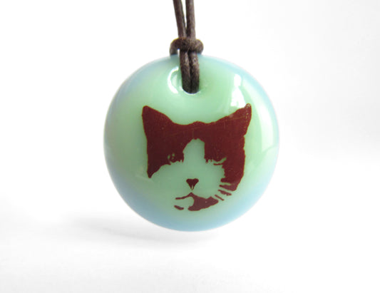 Cat Necklace in mint green and light blue. 
