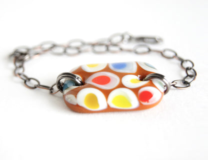 Multicolor spotted brown fused glass adjustable bracelet.