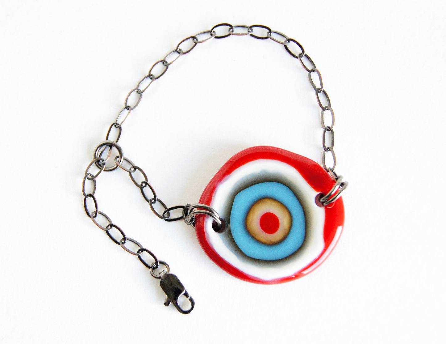 Fun, bold red and blue handmade glass disc bracelet.