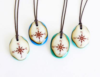 Limited batch of colourful glass compass necklaces