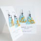 ice blue triangle earrings with gold vine detail