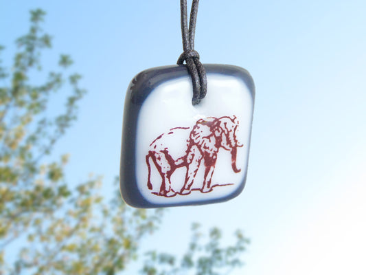 Elephant necklace in charcoal grey and white.
