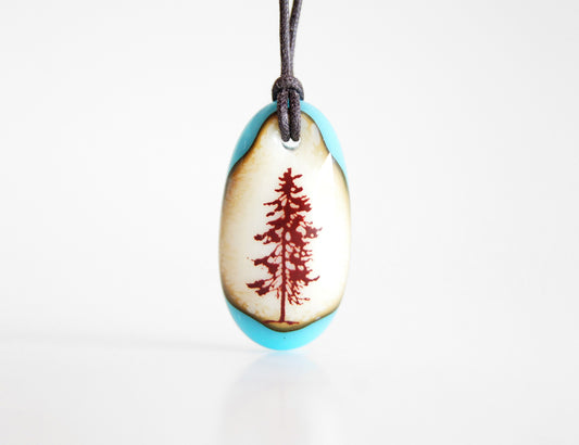 Evergreen Tree Necklace in vintage cream and aquamarine blue. 