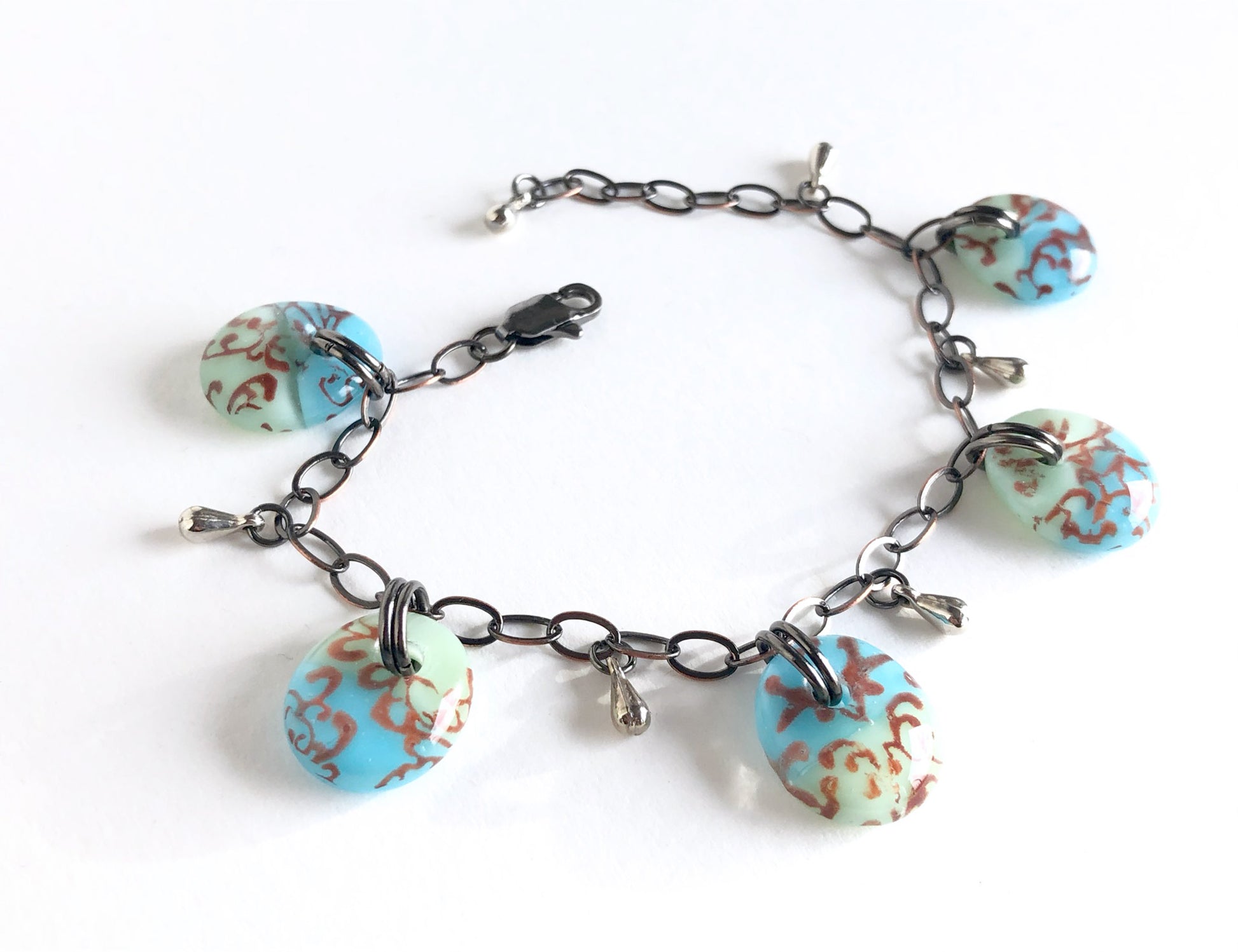 Handmade vintage style blue and green glass drop bracelet.