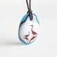 Blue Herons necklace with mom and child birds. 