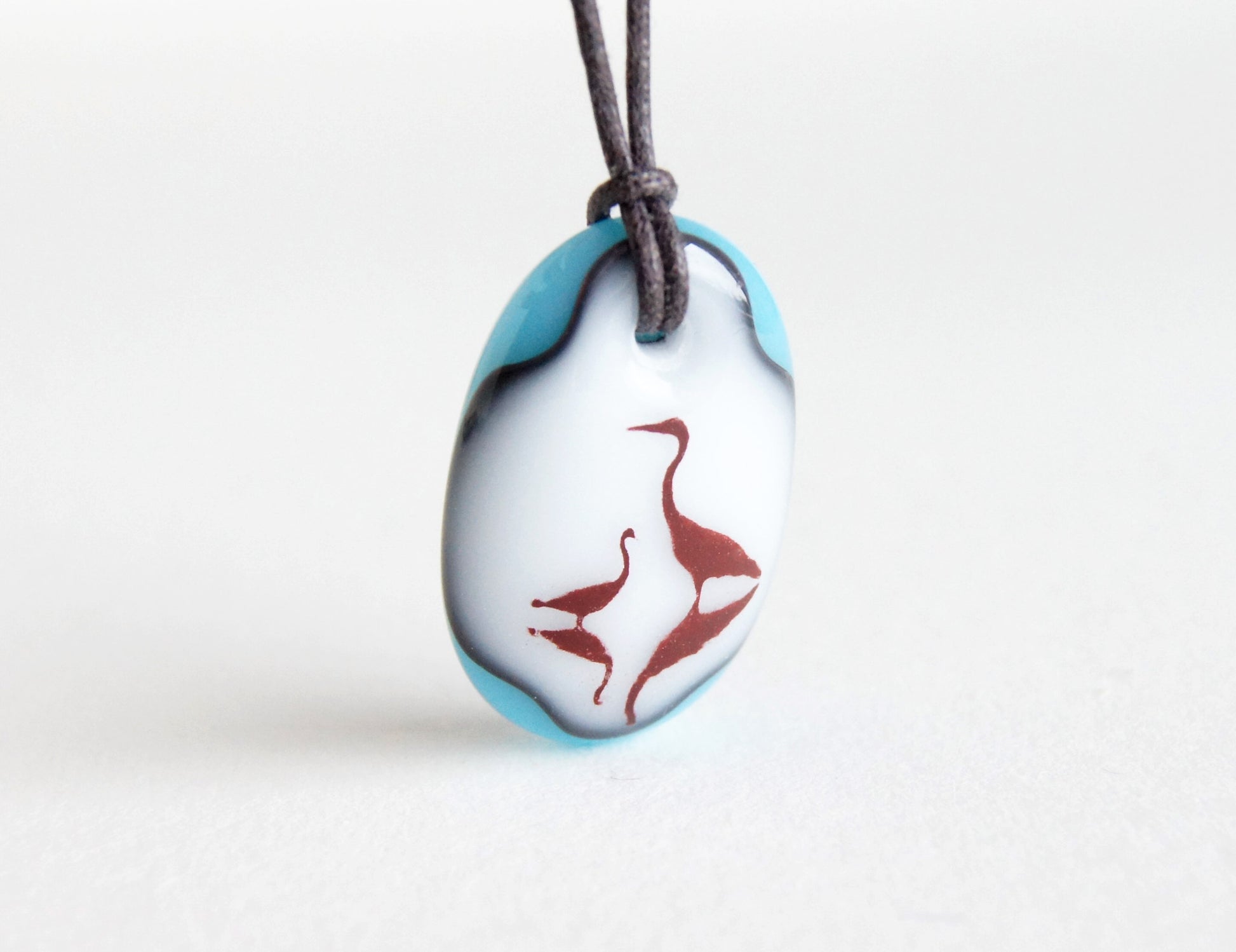 Blue Herons necklace with mom and child birds. 